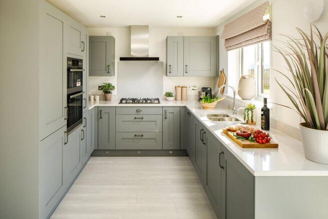 The three sided kitchen has plenty of storage space