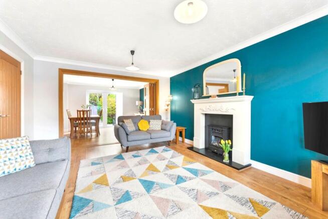 Living Room With Partition Bifold Doors To Dining Room / Family Room