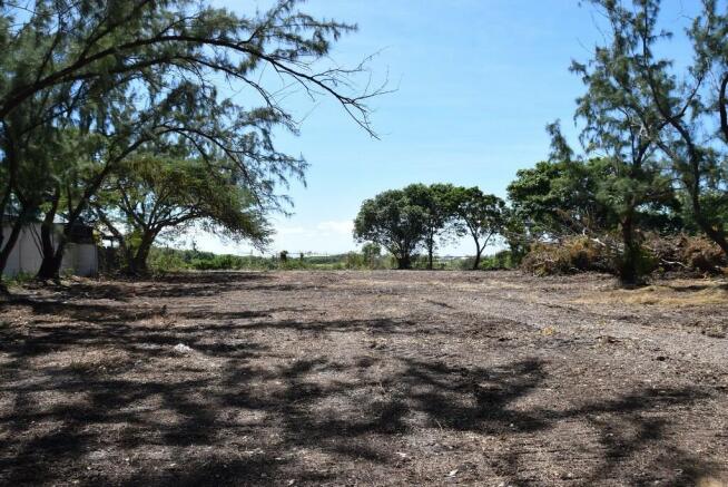 Across lot to South