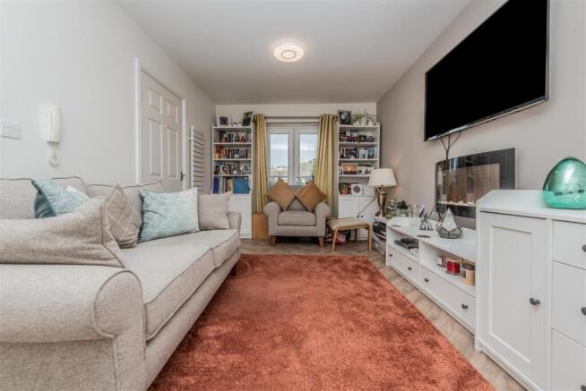 Living Room & Dining Area: