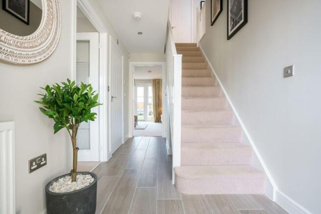 The central hallway with under stairs storage