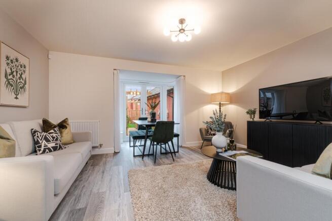 Interior view of the living & dining room in our 4 bed Hythie home