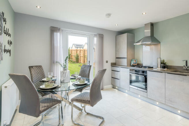 Kitchen and dining room in three bedroom home