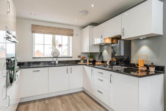 The bright kitchen is the perfect place to whip up food for family and friends