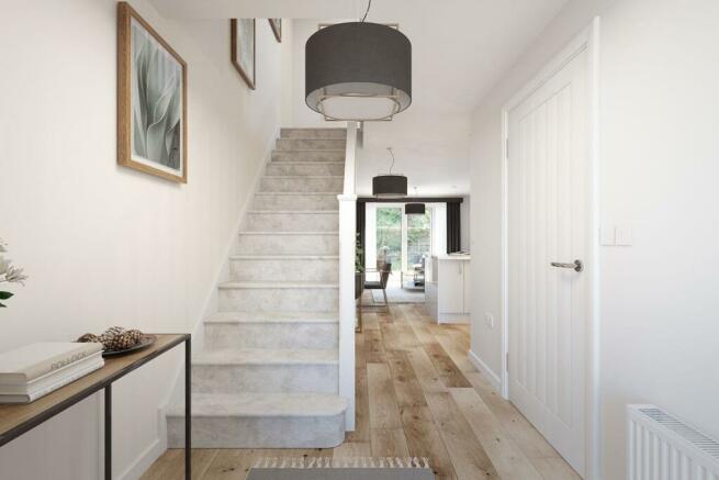 A welcoming hallway leading to the open plan kitchen & dining area