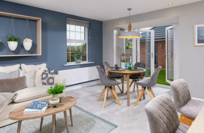 Internal view of a large open plan kitchen with french doors