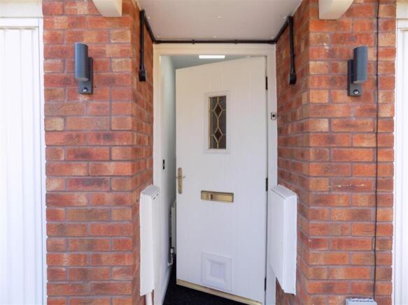Front door ajar (no number).JPG