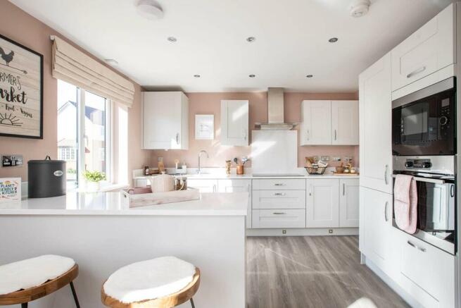 An open plan kitchen and dining area creates the perfect place to entertain