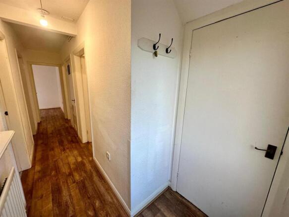 Hallway with storage cupboard