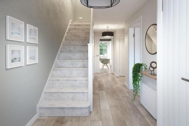 Flooded with natural light, this hallway benefits from a view straight through to the rear garden
