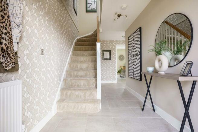 Bright and spacious hallway with under stair storage