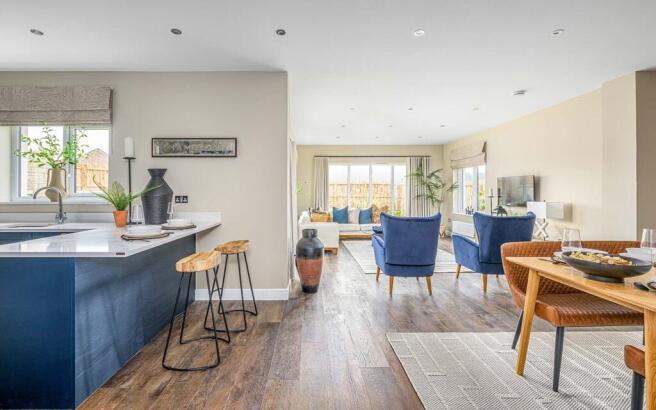 The open plan kitchen diner with garden room is the hub of this home
