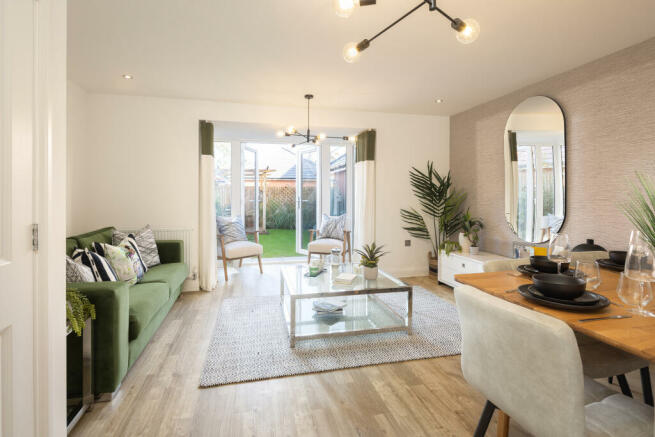 Lounge with French doors in the Woodcote 4 bedroom home