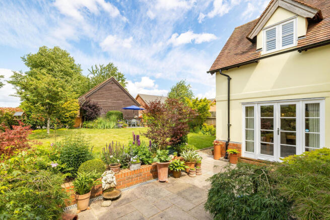 REAR PATIO AND GARDENS