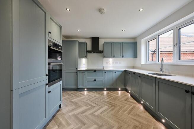 With herringbone flooring and integrated appliances