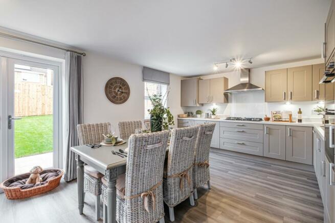 Hurst beige kitchen-diner with French doors to garden