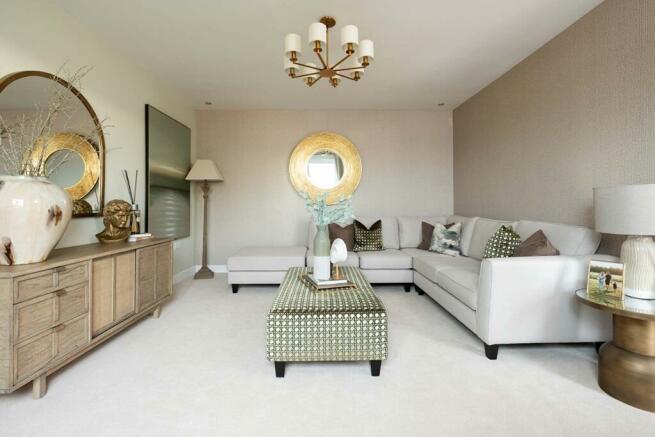 The living room is spacious with space for the whole family to chill out together