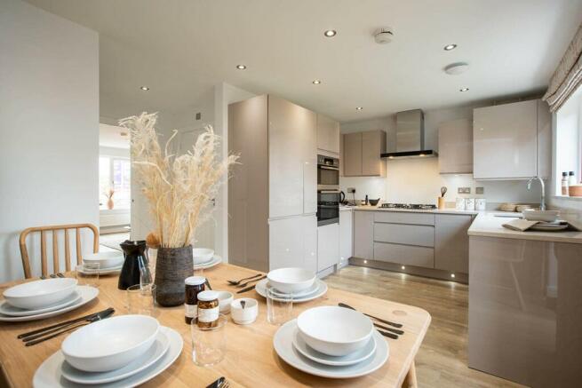 An open plan kitchen and dining area is the perfect place to entertain family and friends