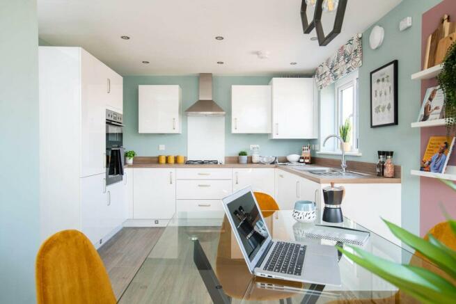 The bright and airy kitchen is perfect for entertaining family and friends
