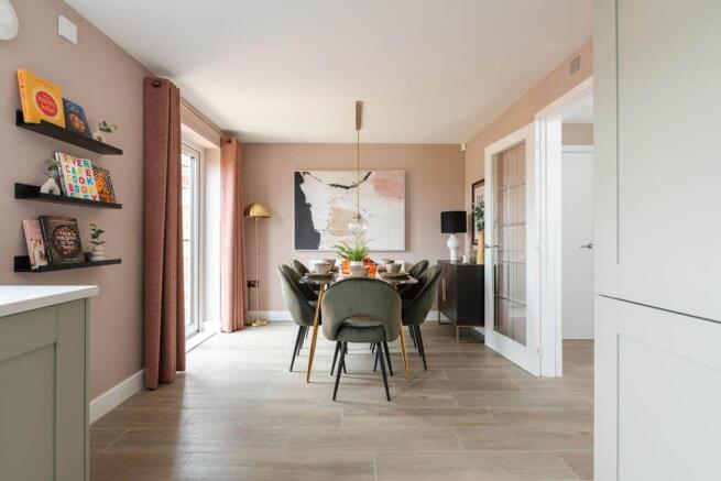 An open plan kitchen dining area offers the perfect space to entertain