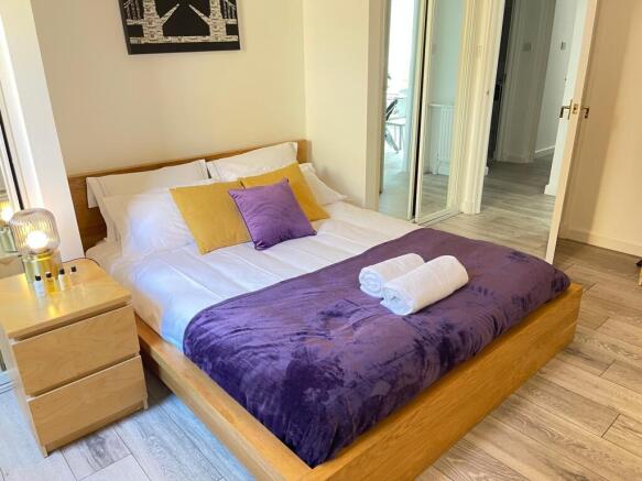 A beautifully decorated double bedroom featurin...