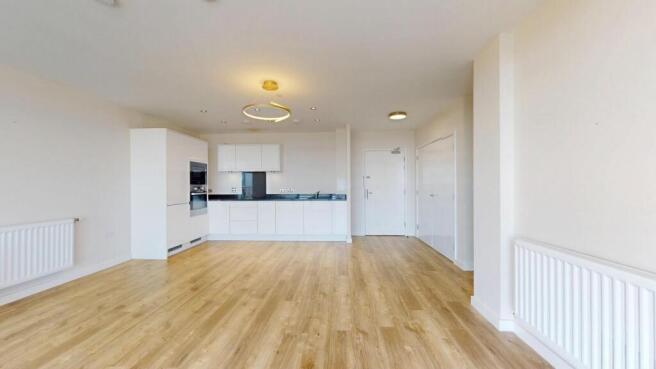 Bright and spacious living room with a modern o...