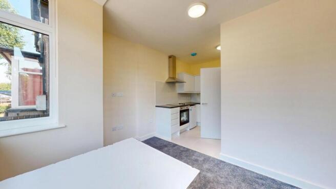 Bright and clean kitchen area featuring modern ...