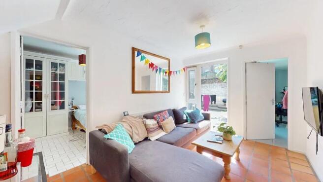 Bright and inviting living room featuring a com...