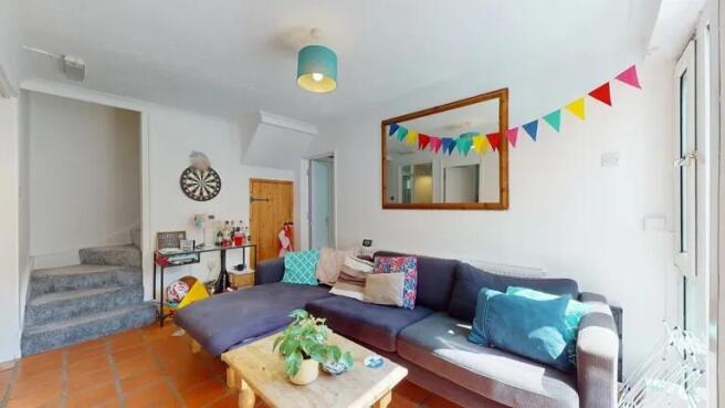 Bright and welcoming living room featuring a sp...