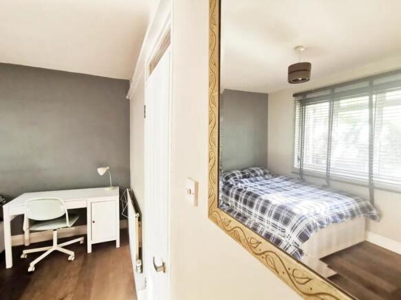 Bright and inviting master bedroom featuring a ...