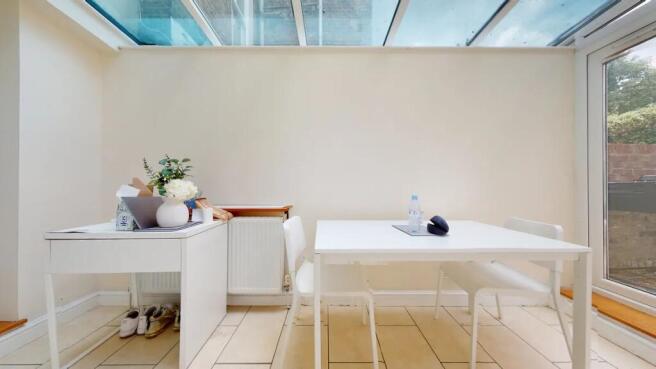 Bright communal workspace featuring a modern wh...