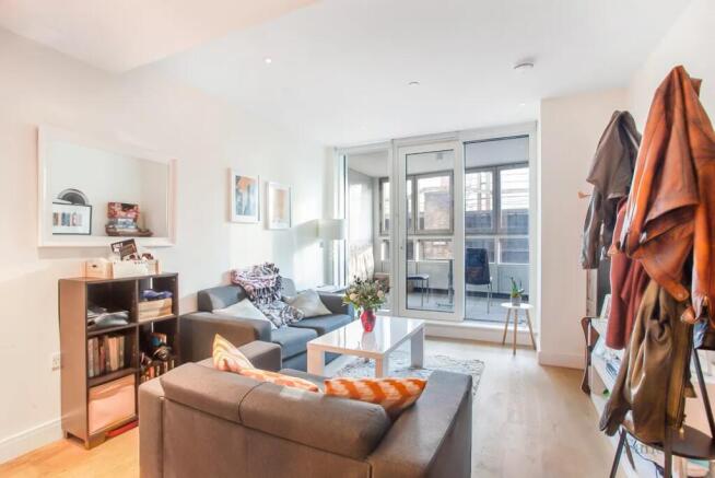 Bright and inviting living room featuring moder...