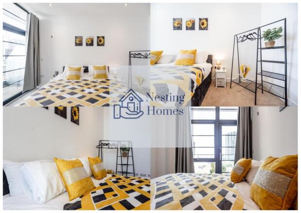 Bright and welcoming master bedroom featuring a...