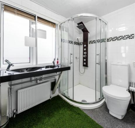 A modern and clean bathroom featuring a stylish...