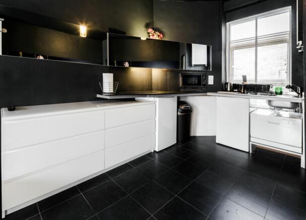 A modern and stylish kitchen with ample storage...