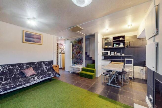 A stylish and inviting living room with modern ...