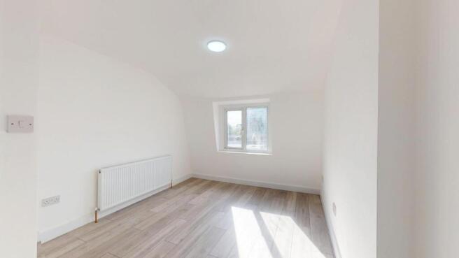Bright, modern bedroom with ample natural light...