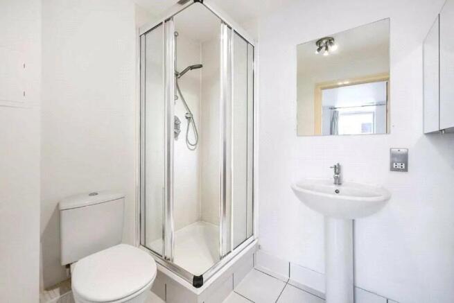 Bright and clean bathroom featuring a modern co...