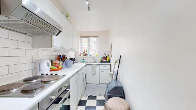 Bright and functional kitchen featuring a class...