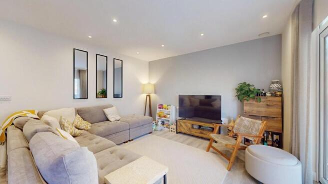 Bright and inviting contemporary living room wi...