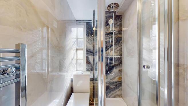 A modern, well-maintained bathroom featuring a ...