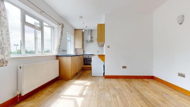 Bright and spacious kitchen with large windows,...