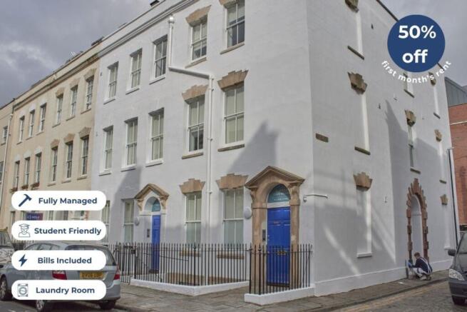 A charming and well-maintained exterior of a st...