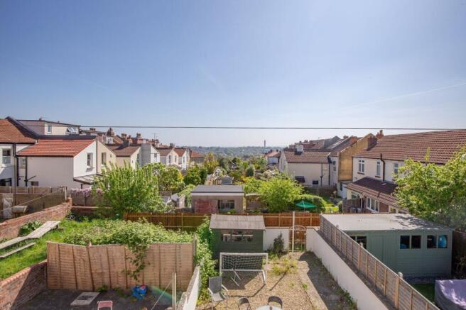 A bright and spacious garden area featuring wel...