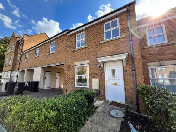 A bright and welcoming front view of the proper...