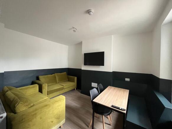 A modern and inviting living room with comforta...