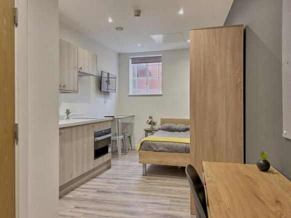 A spacious and modern large double bedroom feat...