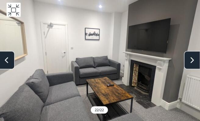 A spacious and stylish modern living room, perf...