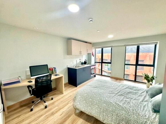 A spacious and bright large double bedroom feat...