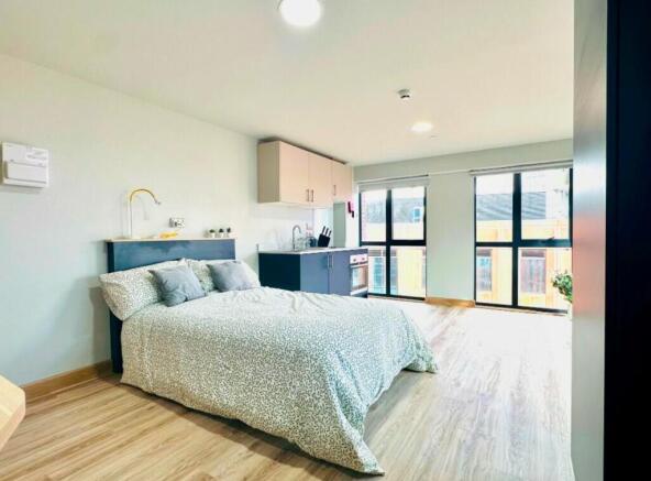 A spacious and bright large double bedroom feat...